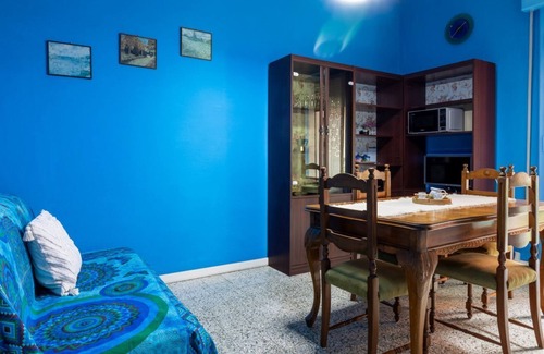 Ferrara Apartment | White Cross Square A Touch of Blue Apartment