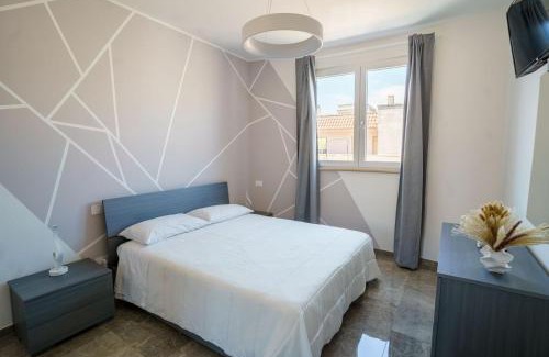 Supersano Bed & Breakfast | White & Grey
