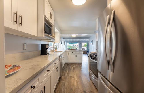 Sunset Beach House | Whole Beachfront House - New Remodel - Views, Spa + Deck