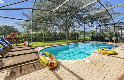 Windsor Hills House | Windsor Hills Tasteful Themed Home w/Heated Pool/Spa ~ 3 Miles to Disney World!