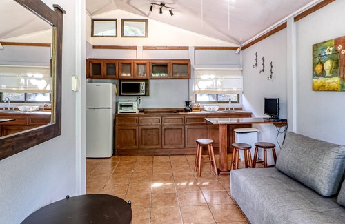 Santa Eulalia Cabin | Wonderful ground-level cabin with gardens, terrace, and shared pool!