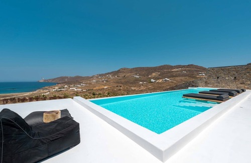 Ftelia Villa | Wonderful Mykonos Villa | Villa Rohfa | 5 Bedrooms | Unique Aegean Sea Views |.