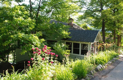 Saranac Lake House | Wooded Hilltop Retreat in Historic Saranac Lake