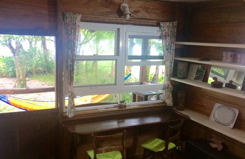 Puerto Barrios House | Wooden cabin in front of beach , bedroom for 2 , private bathroom , barbecue .