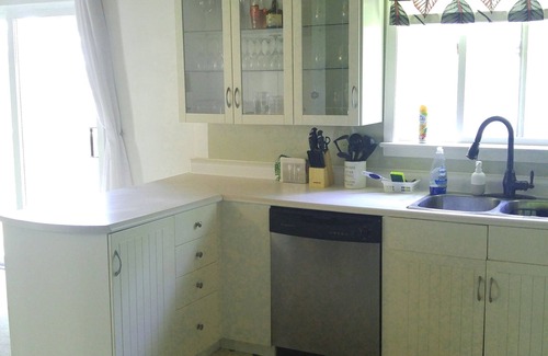 Prince Edward House | Woodsy hillside cottage with water view