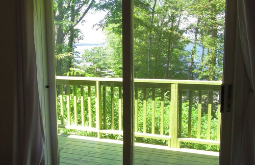 Prince Edward House | Woodsy hillside cottage with water view