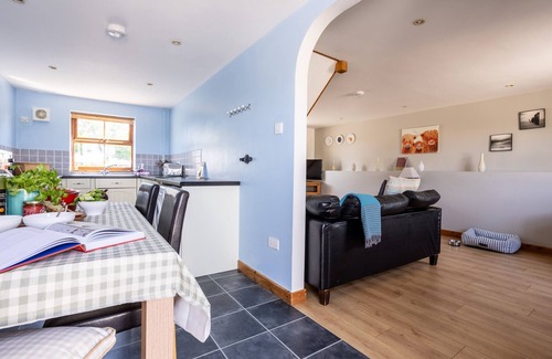 Llanfaelog House | Y Stabl: Pet-friendly cottage with stunning views