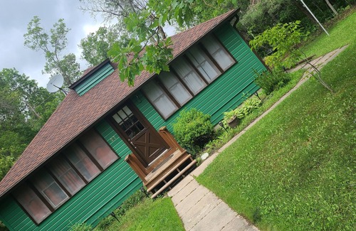 Sandy Hook Cabin | Year round cozy cabin rental steps away from the lake. nPet friendly !