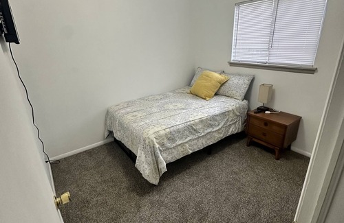 Tulsa House | Yellow House with the Red Door - 5 minute drive to Hardrock Casino!