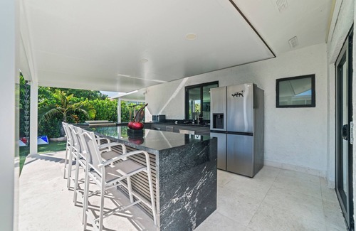 Ludlam Resort | You'll be captivated by the stunning 28 x 40 custom heated pool with jacuzzi