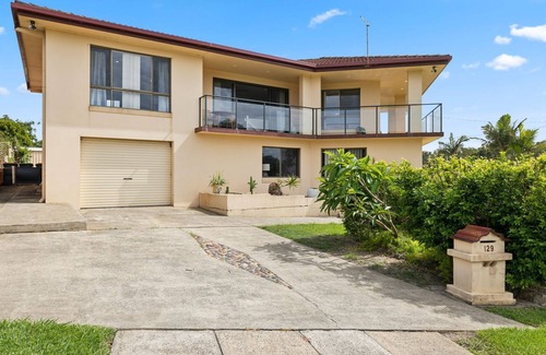 Sandy Beach House | You’ll love being front row on Sandy Beach in this airy elevated holiday home.