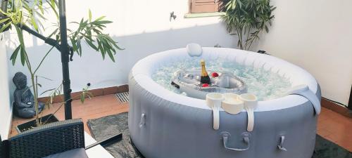 Casale Monferrato Apartment | Zen Retreat with Jacuzzi, Patio & Private Garage Plus Automatic Check in 24 7 with Netflix Dazn and Disney Plus