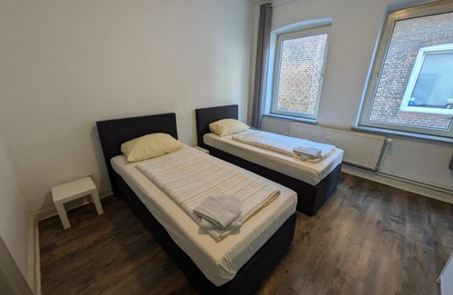 Neumuenster Apartment | Zentrale City Apartments - Optimal für Kurz- oder Langzeitaufenthalte