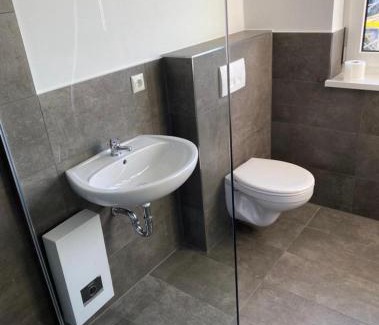 Rotgesbuttel House | Zimmer mit Bad und Küche
