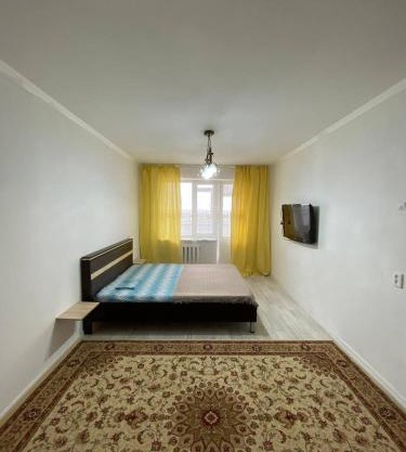 Уютные апартаменты в 11 микрорайоне