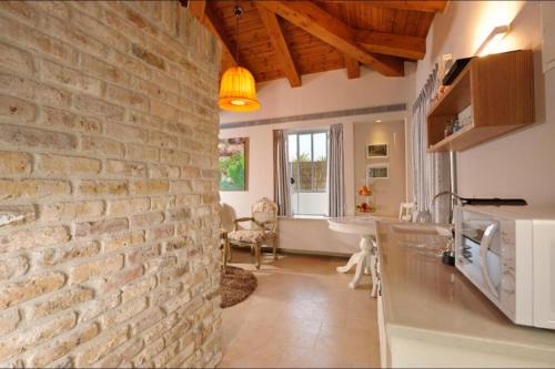 אחוזת הכורמים חד נס - סוויטות עם Hot-tub פרטי