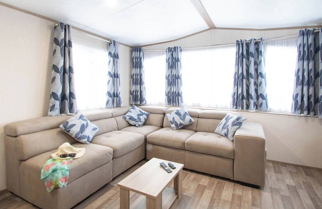 12ft-wide caravan with one double with en suite bathroom and one twin bedroom.