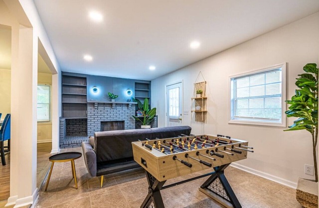 1915 Melbourne Ave NE · ⤘The Silhouette⬽ Airy, 4 Bedroom Home + Air Hockey