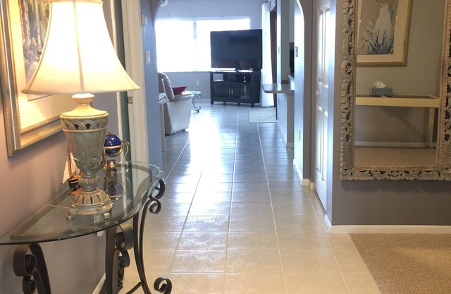 2 bedrooms, 2 baths with pool on canal, walking distance to Beach Park
