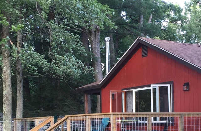 2 cottages on Whalen lake/ Baldwin MI Sleeps 12. Steps from sandy beach