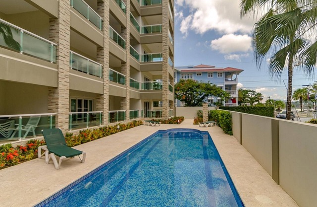 2BD guest-friendly Sosua condo with sea views, steps from clubs and beach