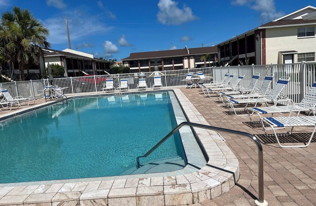 2BR Condo w/Pool, Wi-Fi & Parking – Walk to Groceries, 3 Miles from Beach