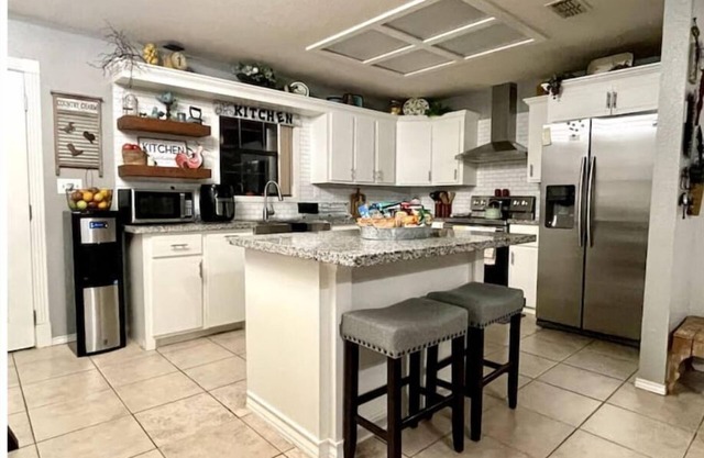 3 Bd/2 Ba open concept home with plenty of parking
