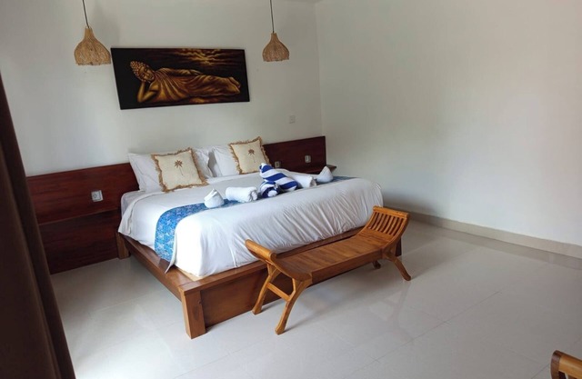 3-bedroom villa in tranquil Bali with WiFi, AC. Paradise awaits
