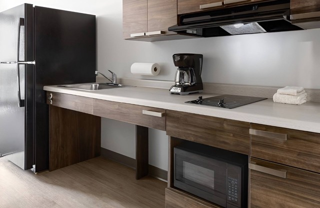 4 Affordable Rooms with Fully Equipped Kitchen for Relaxing After the Game