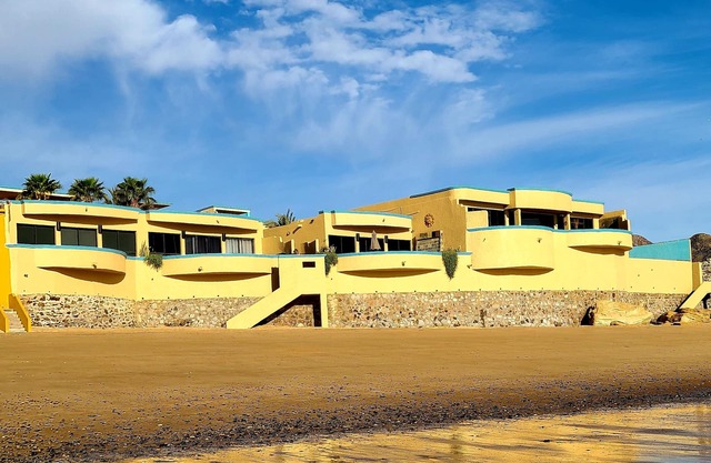 50 Steps to Sandy Beach! Relax at this Seaside Getaway close to downtown.