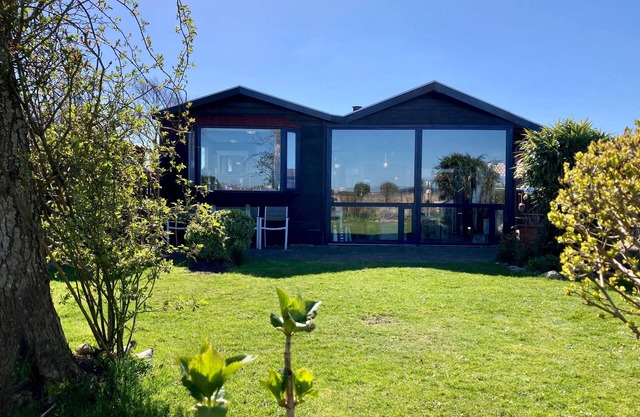 6 pers House Marijke with winter garden and direct access to the Lauwersmeer