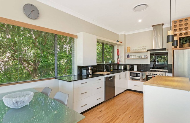 8/24 Panorama Drive - Modern unit set amongst the trees with beach views