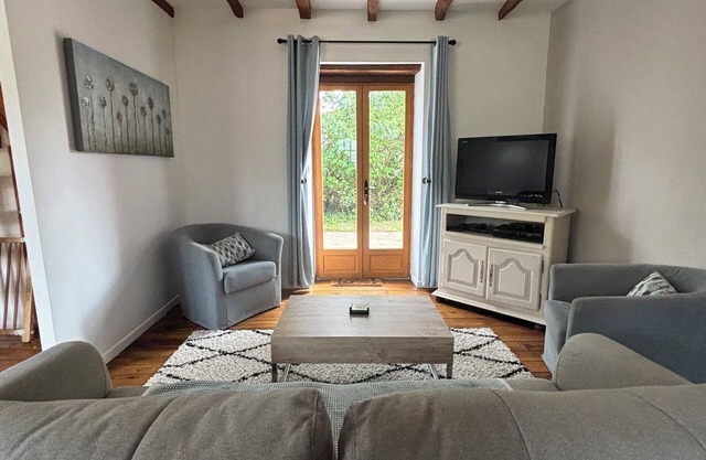 A 3 bedroom cottage that sleeps 6 guests with a heated covered pool