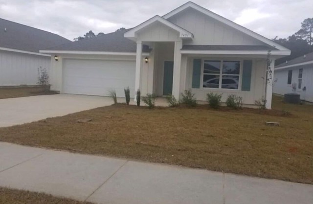A 4-bedroom, 2 bath home with pond view.