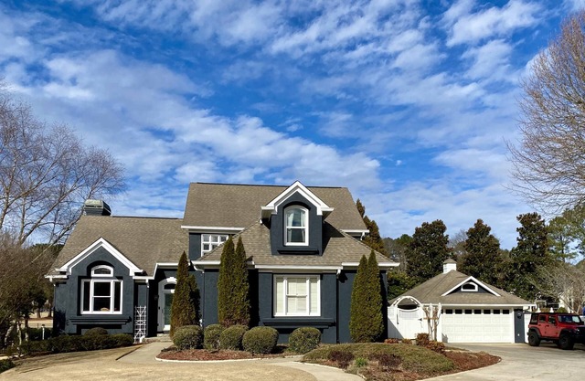 A beautiful pool and garden oasis on the golf course and PTC's golf cart paths.