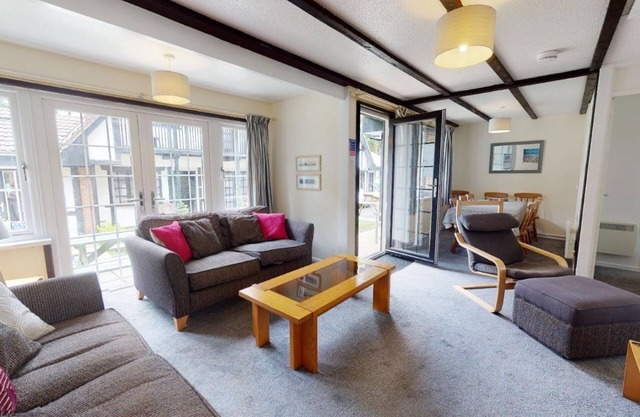 A comfortable accommodation for up to nine guests set within the grounds of Tolroy Manor