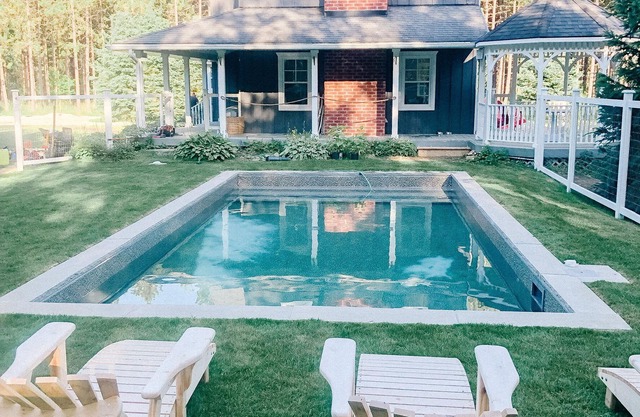 A country home minutes from Creemore with an inground pool and hot tub.