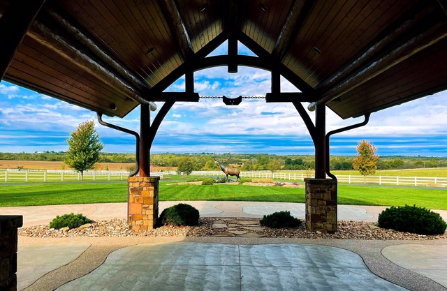 A one-of-a-kind Log Lodge on over 200 acres of panoramic views & serene settings