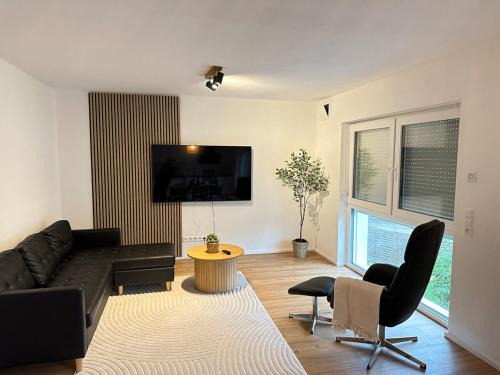 AB2 OG I Top-Wohnung mit Balkon & privatem Eingang I Garage I 3 Min zur S-Bahn - Nähe Messe Stuttgart & Daimler - Ideal für Geschäftsreisende, Familien & Projektteams