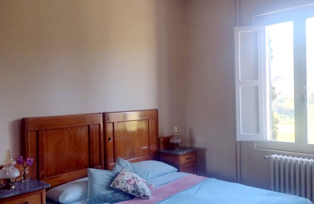 Accommodation nestled in the countryside, with natural landscapes, and meadows.