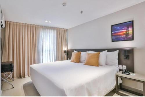 Acomodações próximo ao Mar no Quality Hotel - By Flat Service