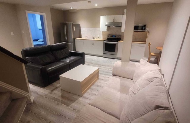 Airy, spacious, nature facing walk-out suite