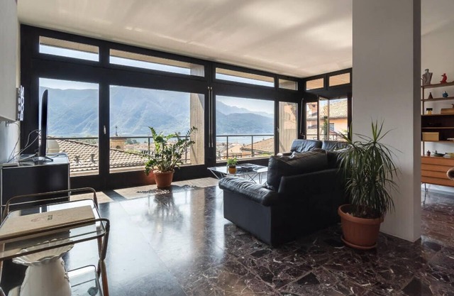 amazing design apartment with balcony overlooking the lake with private garage