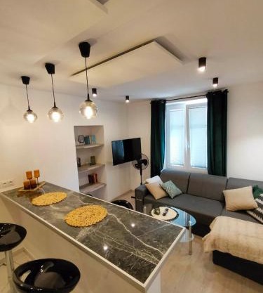 Apartament w centrum miasta przy parku i jeziorze