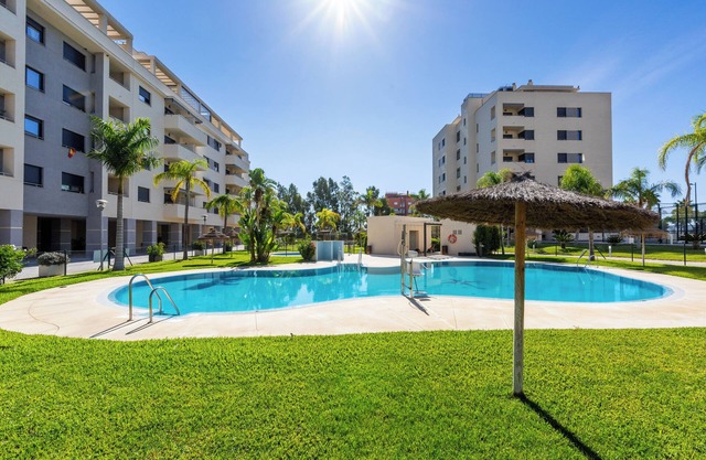 Apartamento Playa Marinsa with Shared Pool, AC, Balcony & WiFi