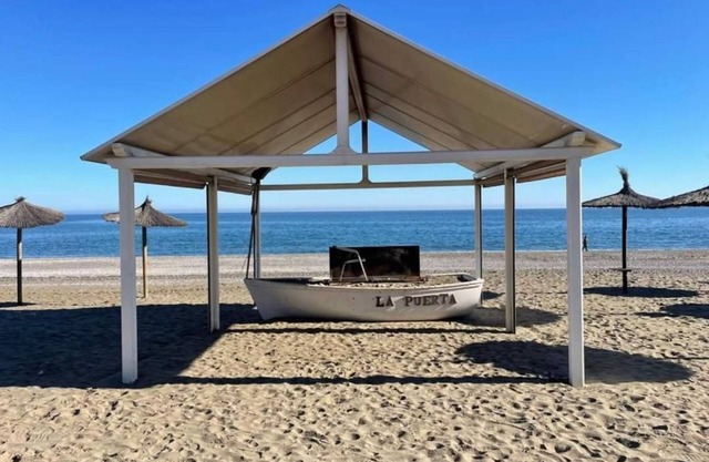 Apartment 'Sabinillas Front Line Beach' with Shared Pool, Wi-Fi and Air Conditioning