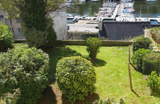 apartment overlooking garden and sailboats