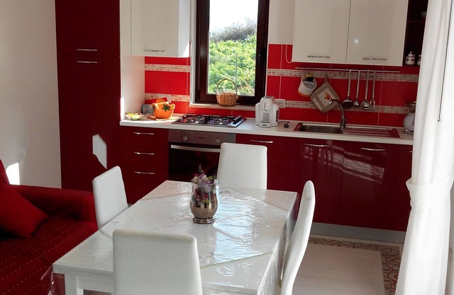 Apartment with garden and "Luna Rossa" terrace