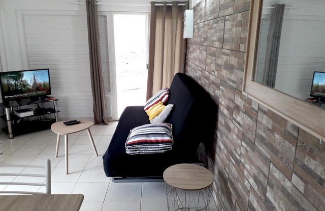 Appartement charmant à Saint-Joseph avec jardin et terrasse, 60 m²