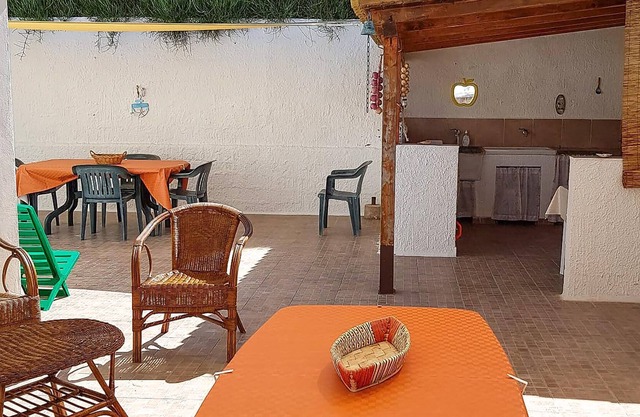 Are you looking for a charming vacation home very close to the sandy beach? Then this house might be